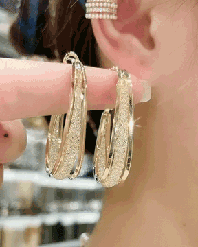 Pendientes ovalados huecos con aros en forma de U