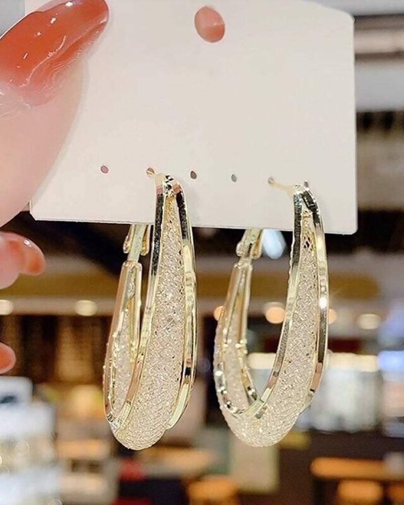 Pendientes ovalados huecos con aros en forma de U
