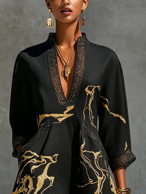 Adriana | Minivestido negro con estampado de mármol dorado